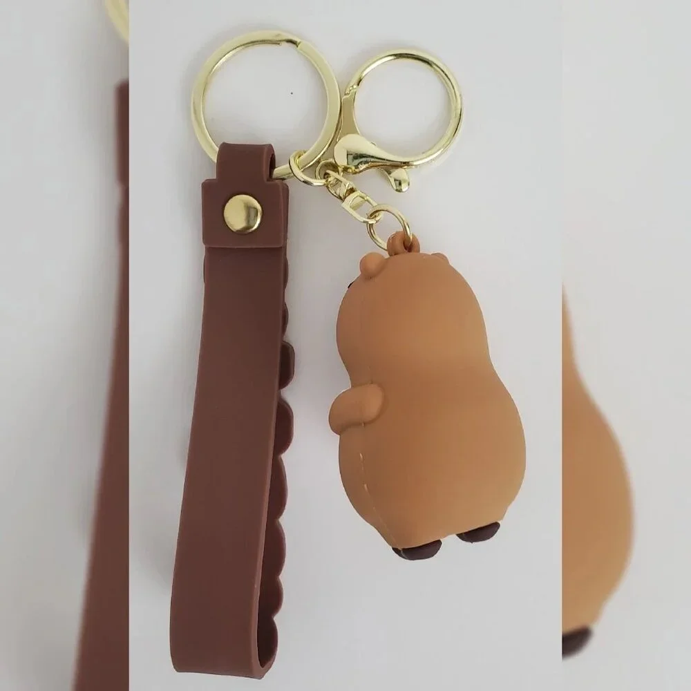 NWT CAPYBARA KEY CHAIN DIFFERENT ACTIONS 3D LOGO